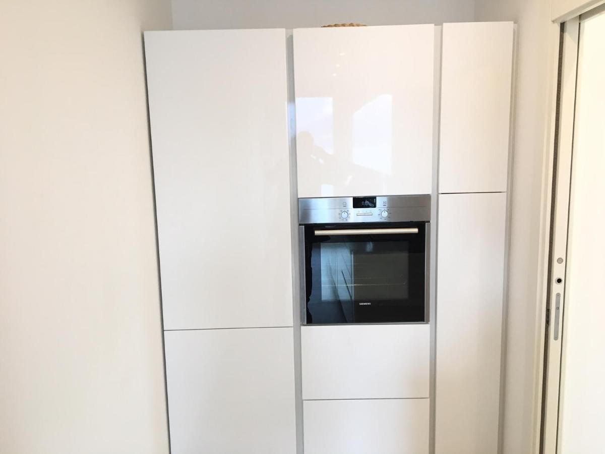 Attico Palazzo Di Vetro Apartment Luino Bagian luar foto