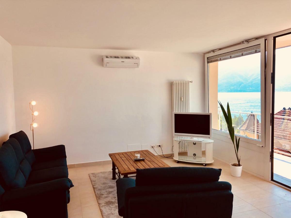 Attico Palazzo Di Vetro Apartment Luino Bagian luar foto